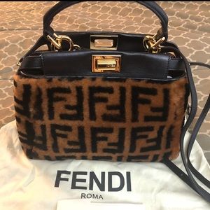 FENDI Zucca micro shearling peekaboo bag with strap. 
10inL x 8inH